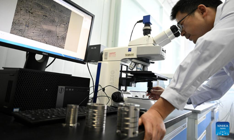 Liu Wangli, staff member of the Institute of Solid State Physics of Chinese Academy of Science (CAS), works at Hefei Institutes of Physical Science of CAS in Hefei, capital of east China's Anhui Province, on April 19, 2023. (Xinhua/Huang Bohan)