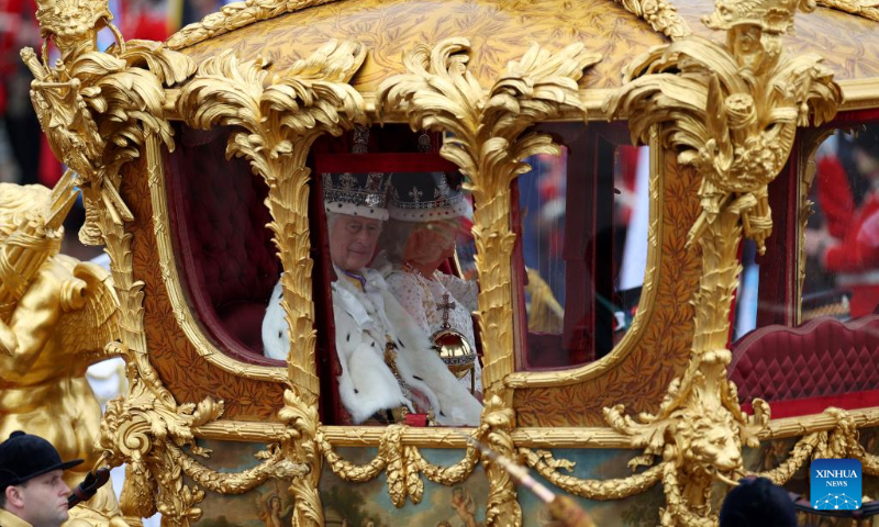Britain's King Charles III and Queen Camilla return to Buckingham Palace after coronation service at Westminster Abbey in London, Britain, May 6, 2023. Charles III was on Saturday crowned monarch of the United Kingdom (UK) and 14 other Commonwealth realms in the UK's first coronation since 1953 at Westminster Abbey in central London. (Xinhua/Li Ying)