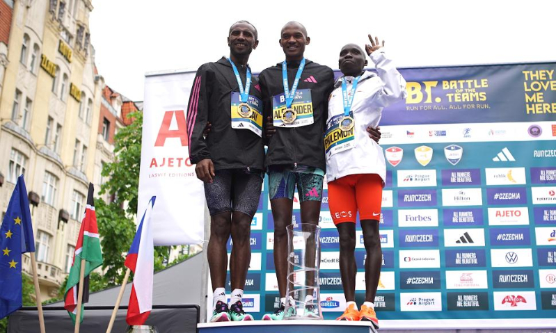 First-place finisher Alexander Mutiso (C) of Kenya, second-place Sisay Lemma (L) of Ethiopia and third-place Philemon Rono of Kenya pose for photos during the awarding ceremony after the men's race of the Prague International Marathon 2023 in Prague, the Czech Republic, May 7, 2023. (Photo by Dana Kesnerova/Xinhua)