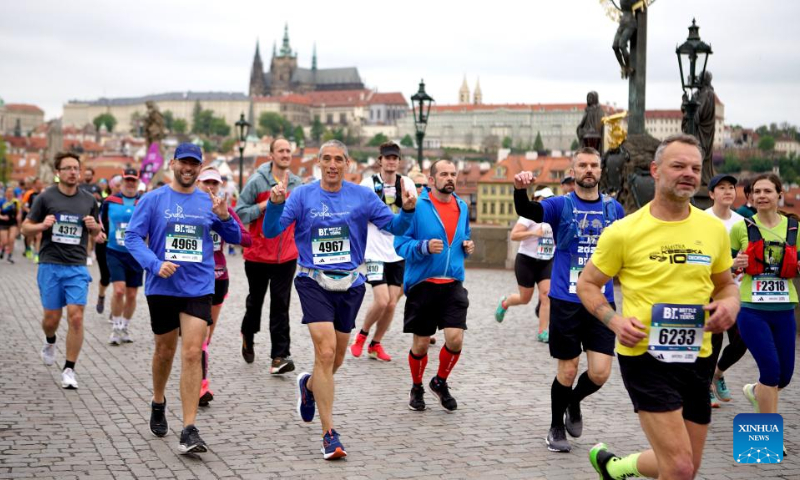 Runners participate in the Prague International Marathon 2023 in Prague, the Czech Republic, May 7, 2023. (Photo by Dana Kesnerova/Xinhua)