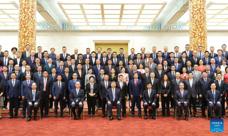 Xi Jinping, general secretary of the Communist Party of China (CPC) Central Committee and Chinese president, meets with representatives to the 10th Conference for Friendship of Overseas Chinese Associations at the Great Hall of the People in Beijing, capital of China, May 8, 2023. Wang Huning, a member of the Standing Committee of the Political Bureau of the CPC Central Committee and chairman of the National Committee of the Chinese People's Political Consultative Conference, and Cai Qi, a member of the Standing Committee of the Political Bureau of the CPC Central Committee and director of the General Office of the CPC Central Committee, were present at the meeting. (Xinhua/Li Xueren)