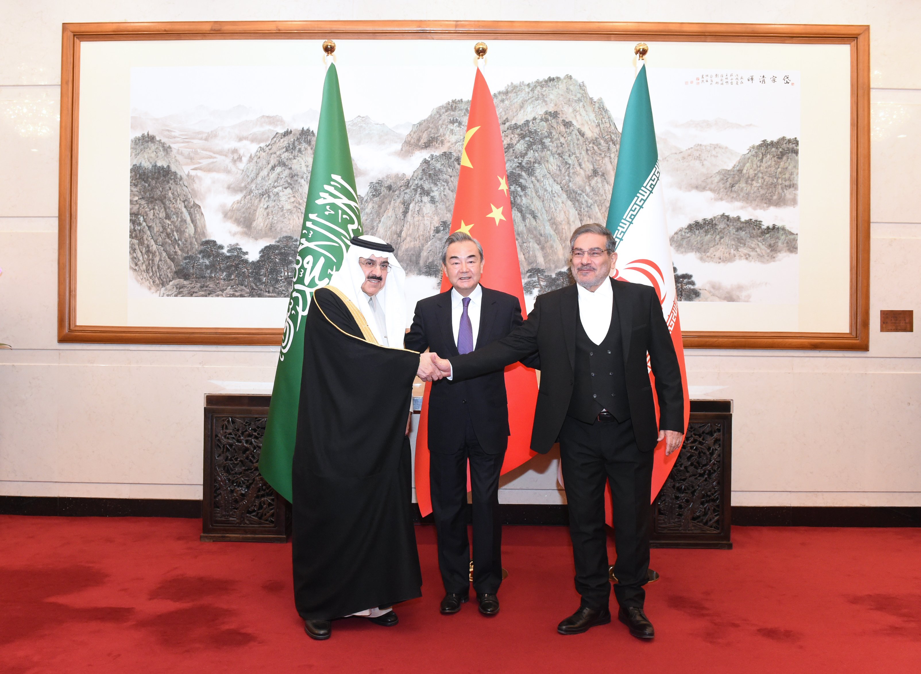 Wang Yi (C), a member of the Political Bureau of the Communist Party of China (CPC) Central Committee and director of the Office of the Foreign Affairs Commission of the CPC Central Committee, attends a closing meeting of the talks between the Saudi delegation led by Musaad bin Mohammed Al-Aiban (L), Saudi Arabia's Minister of State, Member of the Council of Ministers and National Security Advisor, and Iranian delegation led by Admiral Ali Shamkhani (R), Secretary of the Supreme National Security Council of Iran, in Beijing, capital of China, March 10, 2023. (Photo: Xinhua)