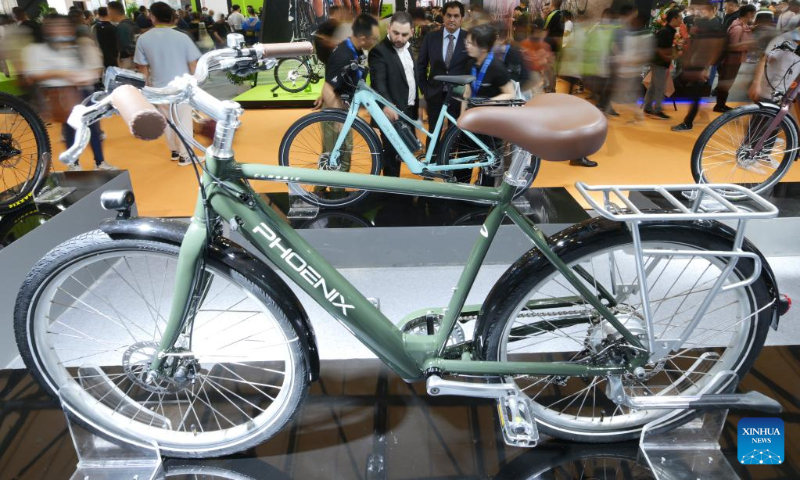People visit the 31st China International Bicycle Fair in east China's Shanghai, May 5, 2023. (Xinhua/Li He)