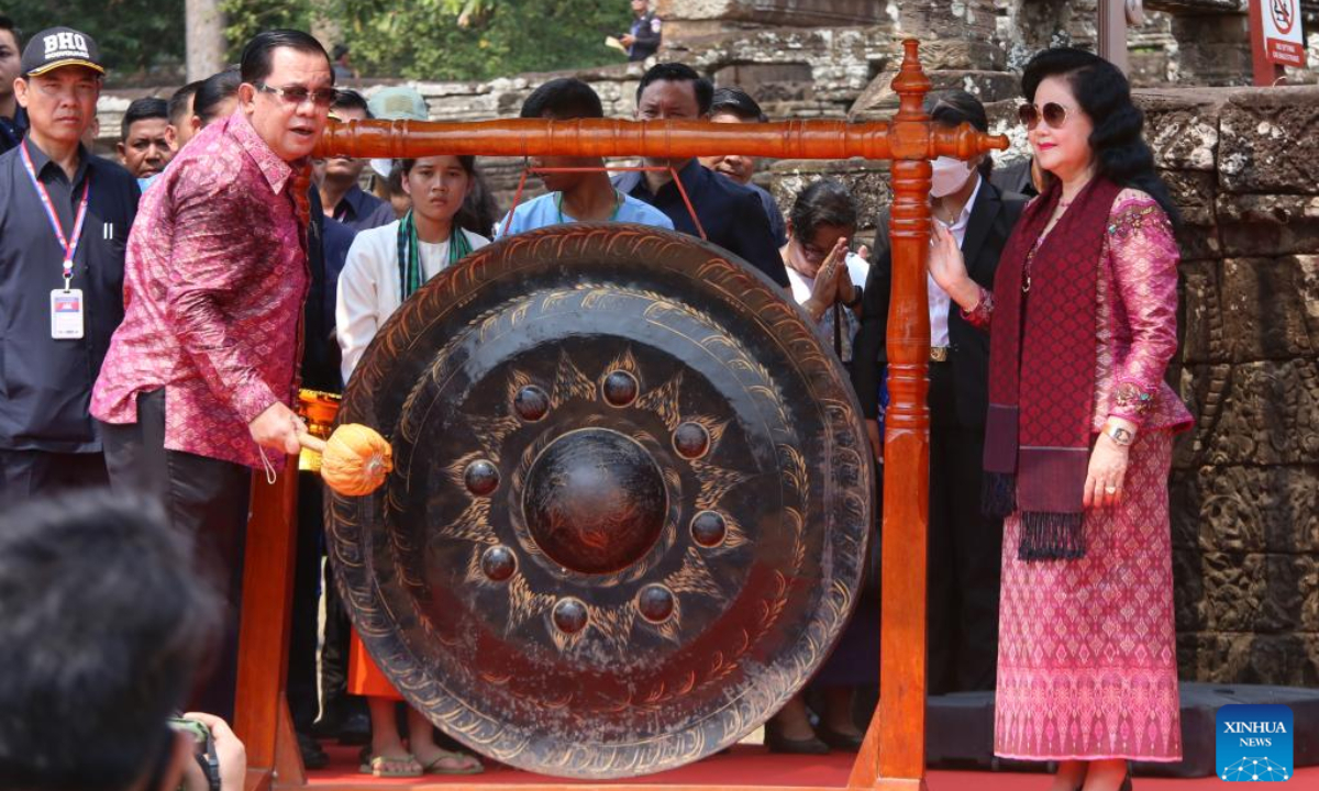 Cambodian Prime Minister Samdech Techo Hun Sen (L, front) beats a gong during the opening ceremony of the Sankranta festival in Siem Reap province, Cambodia on April 14, 2023. Cambodia kicked off the three-day Sankranta festival, or the Khmer New Year celebration, at the famed Angkor Archeological Park on Friday. Photo:Xinhua