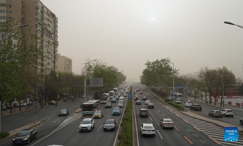 This photo taken on April 11, 2023 shows roads and buildings shrouded in dust in Haidian District of Beijing, capital of China. Floating sand and dust affected Beijing on Tuesday.(Photo: Xinhua)