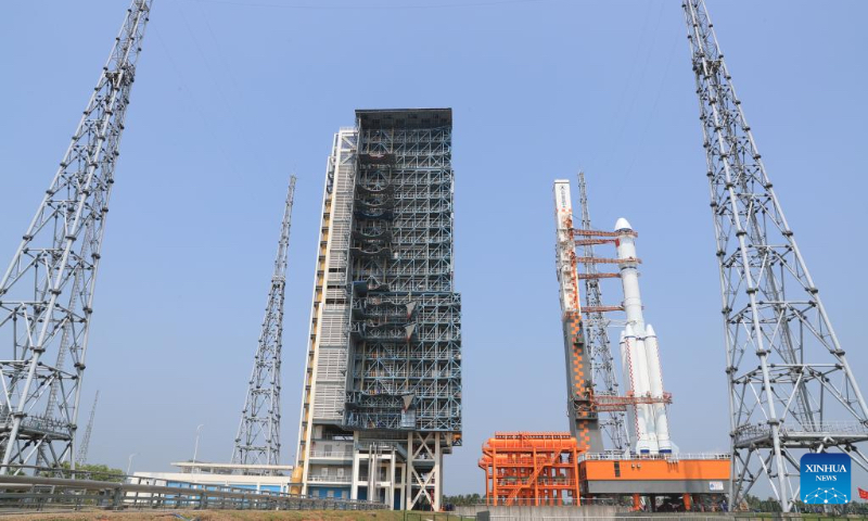 This photo taken on May 7, 2023 shows the combination of the Tianzhou-6 cargo spacecraft and a Long March-7 Y7 carrier rocket being transferred in south China's Hainan Province. The combination of the Tianzhou-6 cargo spacecraft and a Long March-7 Y7 carrier rocket has been transferred to the launching area. The cargo spacecraft will be launched in the near future at an appropriate time. (Photo by Qiu Lijun/Xinhua)