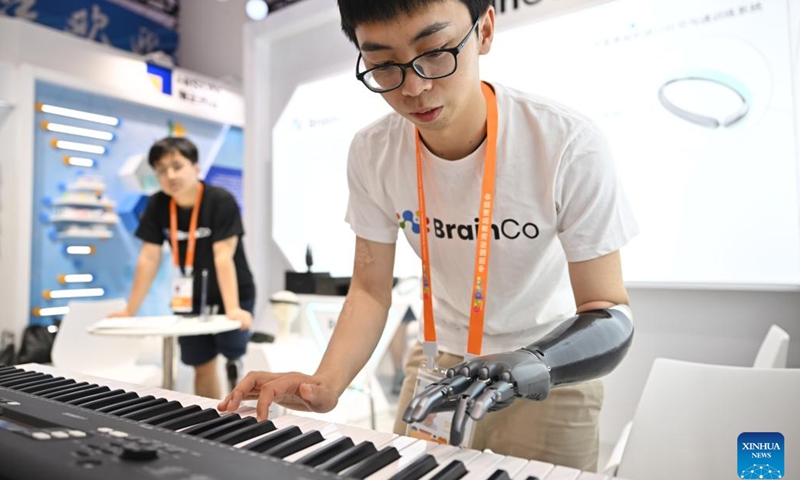 An exhibitor shows a bionic hand at the booth of east China's Zhejiang Province during the third China International Consumer Products Expo (CICPE) in Haikou, capital city of south China's Hainan Province, on April 10, 2023. More than 3,300 high-quality brands from home and abroad have gathered at the third CICPE, which kicked off Monday in Haikou.(Photo: Xinhua)