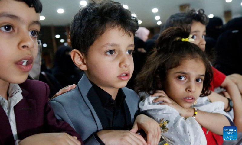 Yemeni children wait to be cleared through the customs at the Sanaa International Airport after being evacuated from Sudan, in Sanaa, Yemen, on May 14, 2023. (Photo by Mohammed Mohammed/Xinhua)