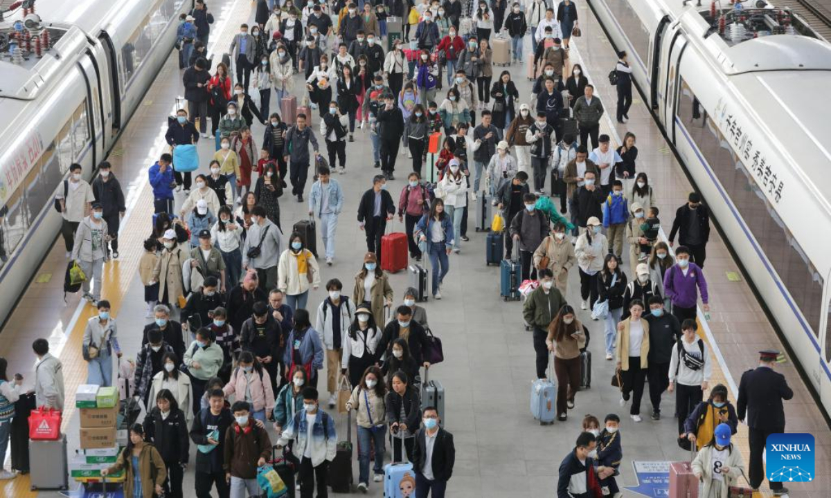 Passengers are pictured at the platform of the Xuzhou East Railway Station in Xuzhou, east China's Jiangsu Province, April 29, 2023. A travel rush is on as the country ushers in the 5-day Labor Day holiday on Saturday. Photo:Xinhua