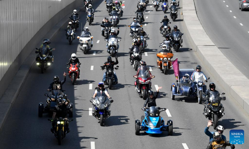 Motorcyclists participate in a motorcycle parade in Moscow, Russia, May 13, 2023. The parade marked the official opening of the motorcycle season in Moscow. (Photo by Alexander Zemlianichenko Jr/Xinhua)