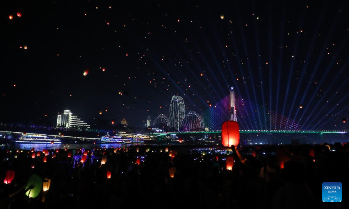 Sky lanterns released during annual Water Splashing Festival in SW