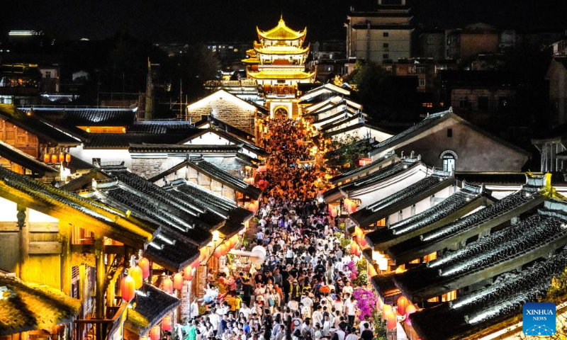People visit Jianchang ancient city in Xichang, southwest China's Sichuan Province, May 1, 2023. China is witnessing a travel boom during this year's five-day May Day holiday. (Photo by Li Jieyi/Xinhua)