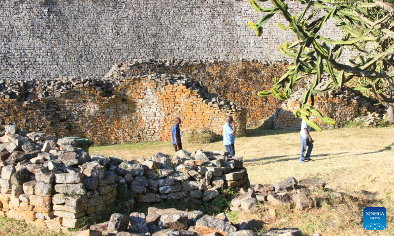 Tourists visit the Great Zimbabwe National Monument in Masvingo Province, Zimbabwe, May 5, 2023. The Great Zimbabwe National Monument was inscribed on the list of world cultural heritages by the UNESCO in 1986 and is one of Zimbabwe's greatest tourist attractions. (Xinhua/Zhang Baoping)