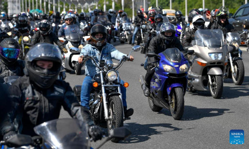Motorcyclists participate in a motorcycle parade in Moscow, Russia, May 13, 2023. The parade marked the official opening of the motorcycle season in Moscow. (Photo by Alexander Zemlianichenko Jr/Xinhua)
