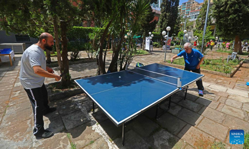 Participants play table tennis in celebration of World Table Tennis Day in Beirut, Lebanon, on April 23, 2023. (Xinhua/Bilal Jawich)