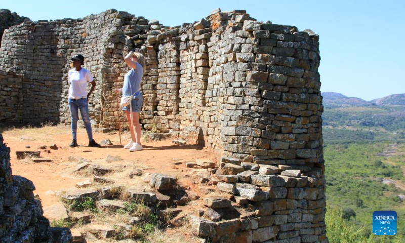 Tourists visit the Great Zimbabwe National Monument in Masvingo Province, Zimbabwe, May 5, 2023. The Great Zimbabwe National Monument was inscribed on the list of world cultural heritages by the UNESCO in 1986 and is one of Zimbabwe's greatest tourist attractions. (Xinhua/Zhang Baoping)