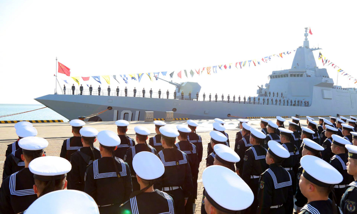 Photo taken on Jan. 12, 2020 shows the ceremony of the commissioning of the Nanchang, China's first Type 055 guided-missile destroyer, in the port city of Qingdao, east China's Shandong Province. Photo:Xinhua 