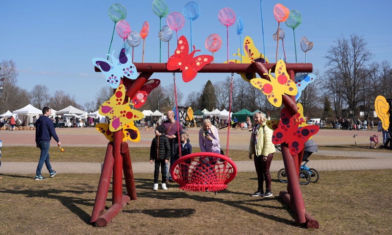 People attend the Swing festival in Sigulda, Latvia, April 8, 2023.(Photo: Xinhua)