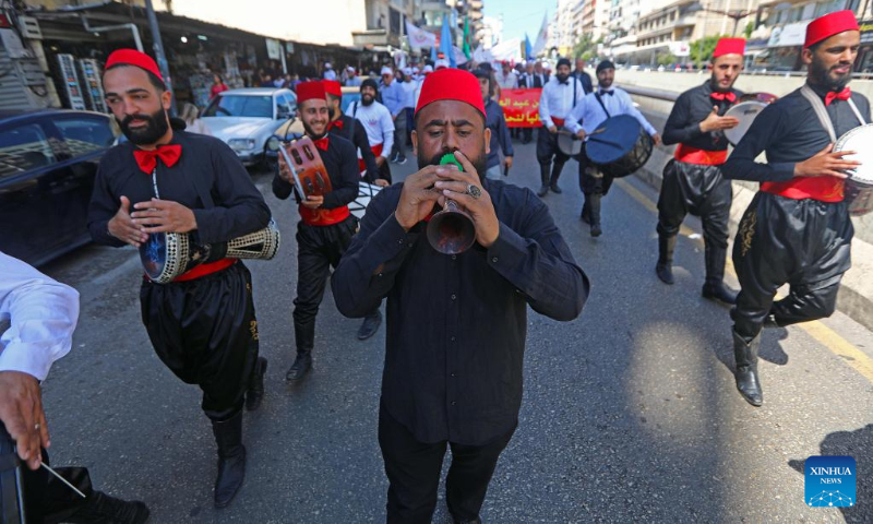 Lebanese celebrate the International Workers' Day in Beirut, Lebanon, on May 1, 2023. (Xinhua/Bilal Jawich)