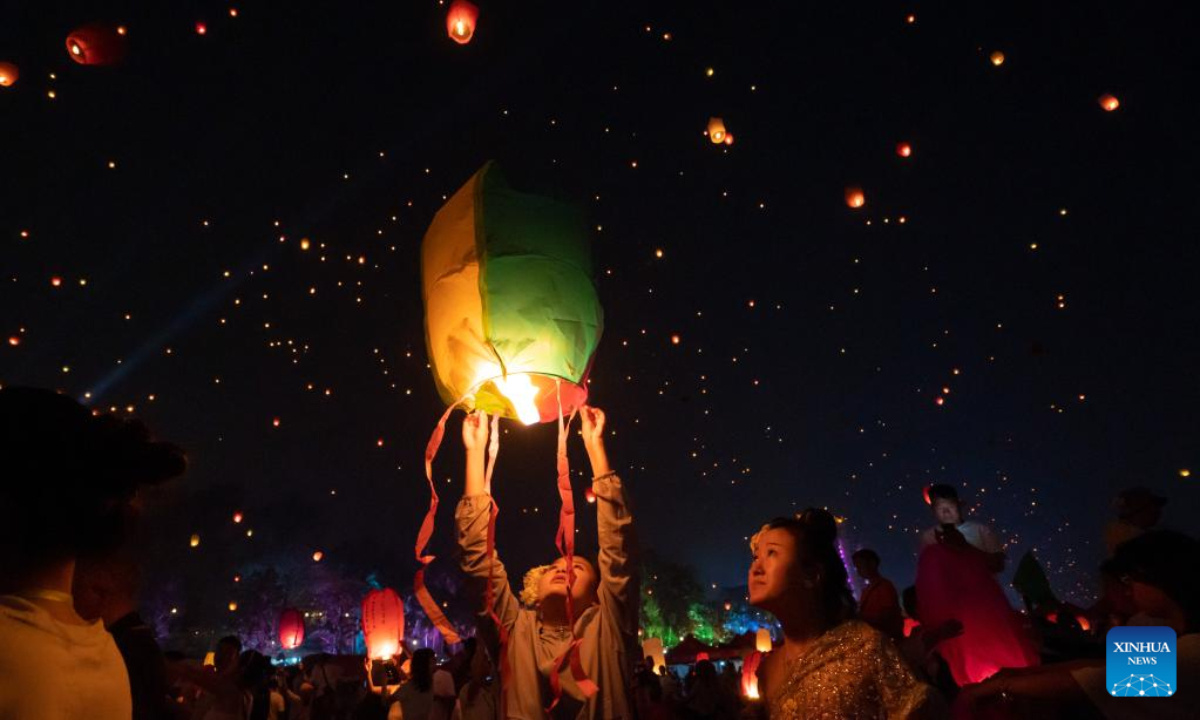 Sky lanterns released during annual Water Splashing Festival in SW China Global Times