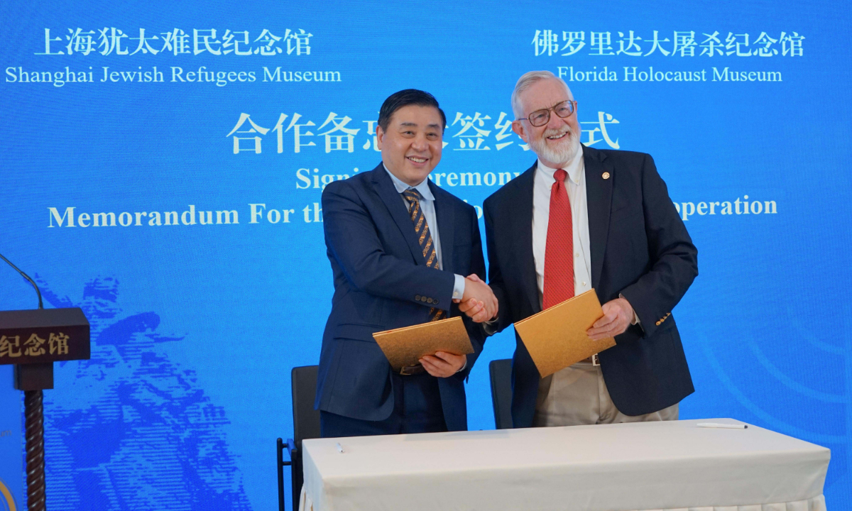 Shanghai Jewish Refugees Museum signs a memorandum of cooperation with Florida Holocaust Museum on May 17. photo: Lu Ting/GT