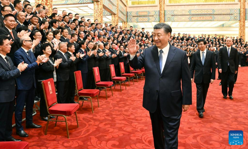 Xi Jinping, general secretary of the Communist Party of China (CPC) Central Committee and Chinese president, meets with representatives to the 10th Conference for Friendship of Overseas Chinese Associations at the Great Hall of the People in Beijing, capital of China, May 8, 2023. Wang Huning, a member of the Standing Committee of the Political Bureau of the CPC Central Committee and chairman of the National Committee of the Chinese People's Political Consultative Conference, and Cai Qi, a member of the Standing Committee of the Political Bureau of the CPC Central Committee and director of the General Office of the CPC Central Committee, were present at the meeting. (Xinhua/Li Xueren)