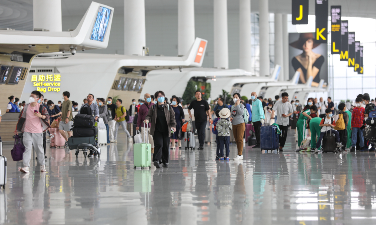 Passengers wait at Guangzhou Baiyun International Airport on April 29, 2023, the first day of the five-day May Day holidays. Photo: Courtesy of Guangzhou Baiyun International Airport 