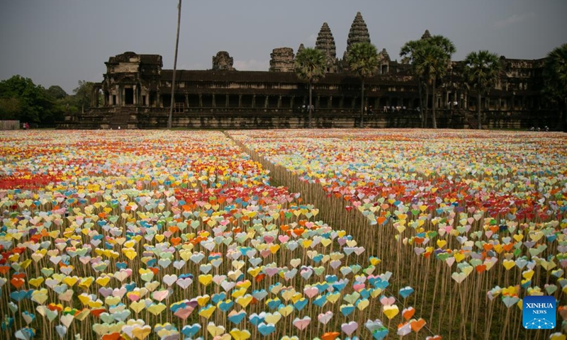 Origami hearts are displayed at the complex of the Angkor Archeological Park in Siem Reap province, Cambodia on April 11, 2023. Cambodia's display of origami hearts was included in the Guinness Book of Records on Tuesday as the world's largest show of origami hearts, breaking the previous record held by Britain, a Guinness World Records adjudicator announced.(Photo: Xinhua)