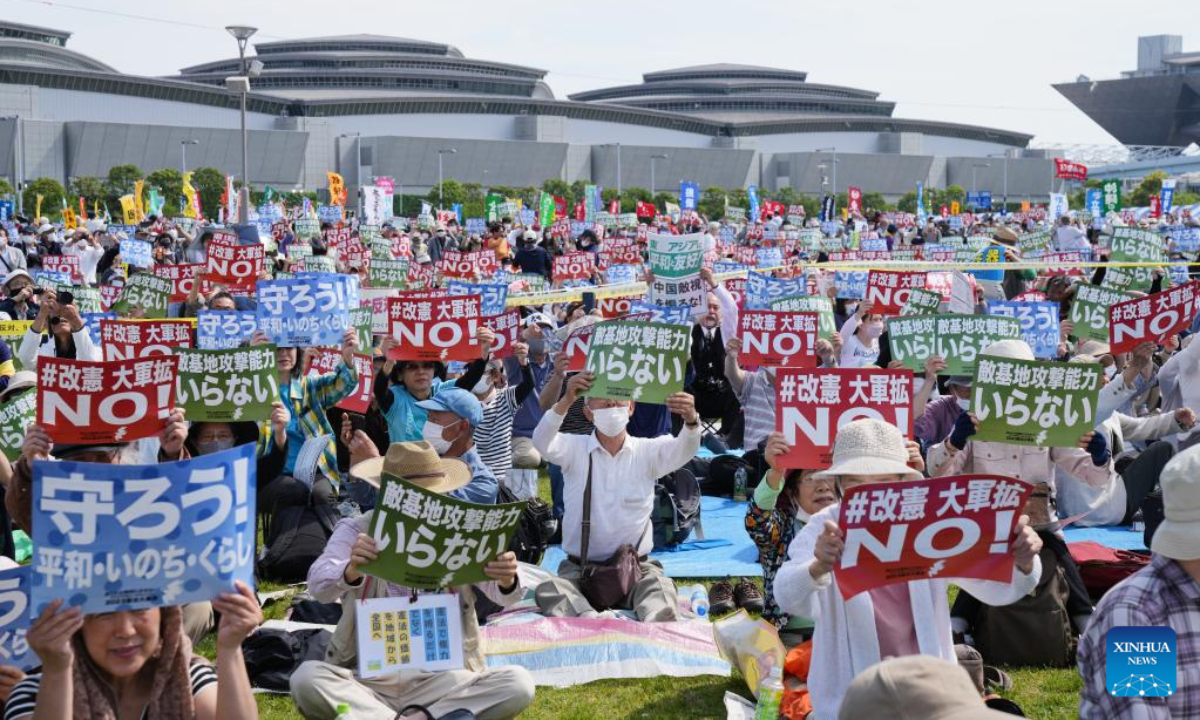 People rally at Tokyo Rinkai Disaster Prevention Park in Tokyo, Japan, May 3, 2023. Some 25,000 Japanese people rallied on Wednesday in Tokyo, calling for peace and protection of Japan's Constitution, including the war-renouncing Article 9, as the country marked the 76th anniversary of its pacifist post-war Constitution. Photo:Xinhua