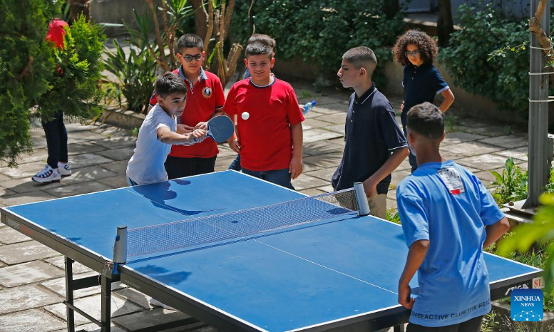 Children play table tennis in celebration of World Table Tennis Day in Beirut, Lebanon, on April 23, 2023. (Xinhua/Bilal Jawich)