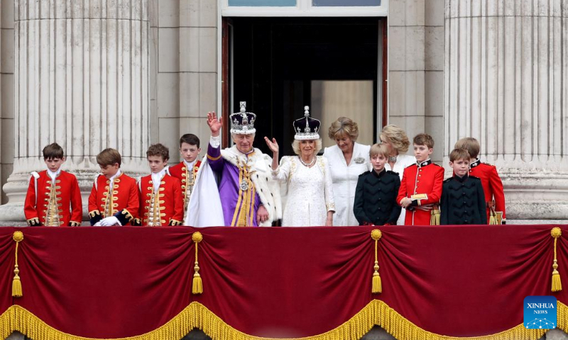 Britain's King Charles III and Queen Camilla wave on the balcony of Buckingham Palace after coronation ceremony in London, Britain, May 6, 2023. Charles III was on Saturday crowned monarch of the United Kingdom (UK) and 14 other Commonwealth realms in the UK's first coronation since 1953 at Westminster Abbey in central London. (Xinhua/Li Ying)