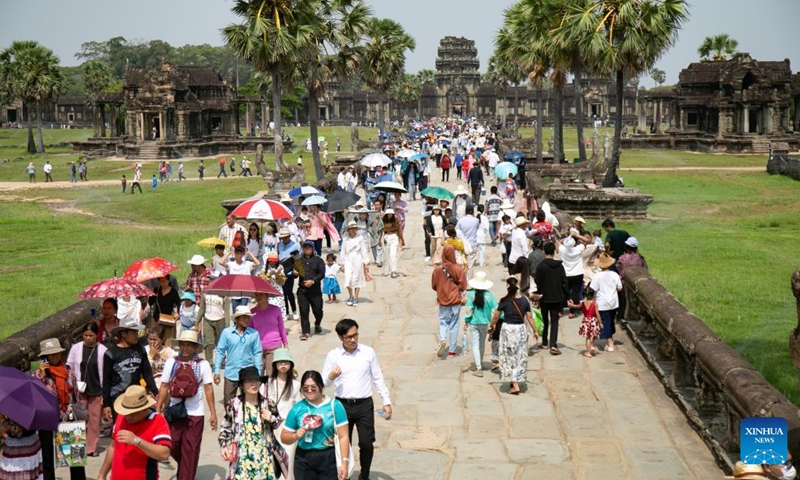 Tourists visit the Angkor Archeological Park in Siem Reap province, Cambodia, April 16, 2023. Cambodia's three-day Sankranta festival, or the traditional New Year celebration, ended on Sunday with 13.1 million people traveling to various tourist attractions across the kingdom, Tourism Minister Thong Khon said on Monday.(Photo: Xinhua)