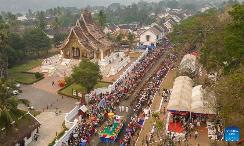 This aerial photo shows people celebrating the Songkran Festival or the Lao New Year, in Luang Prabang, Laos, April 15, 2023. The Lao New Year, celebrated from April 14 to 16, is the most important festival in the Lao calendar and also a time of endless fun for the Laotians.(Photo: Xinhua)