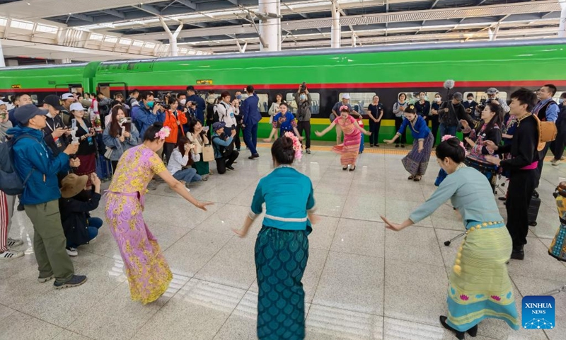 Performers dance during a launch ceremony for the first passenger train from Kunming to the Lao capital Vientiane at Kunming South Railway Station in Kunming, southwest China's Yunnan Province, April 13, 2023.(Photo: Xinhua)