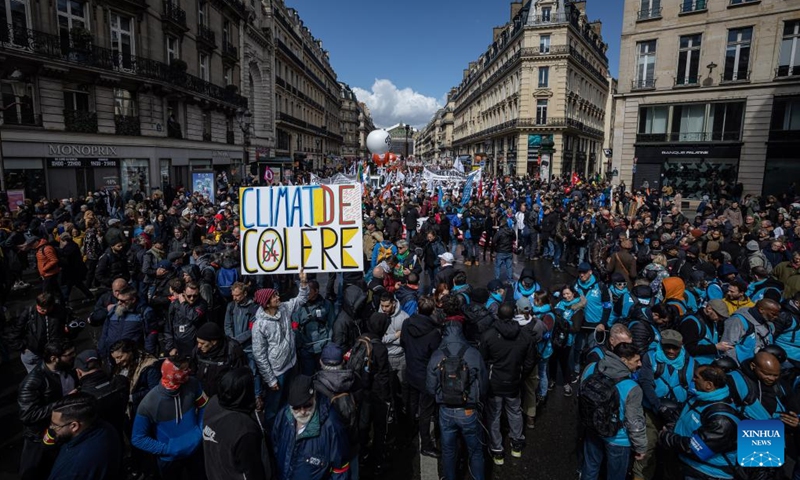 People participate in a demonstration against a pensions reform plan in Paris, France, on April 13, 2023. Around 380,000 people participated in the 12th nationwide general mobilization organized by the unions against the government's pension reform plan, the French Interior Ministry said on Thursday.(Photo: Xinhua)