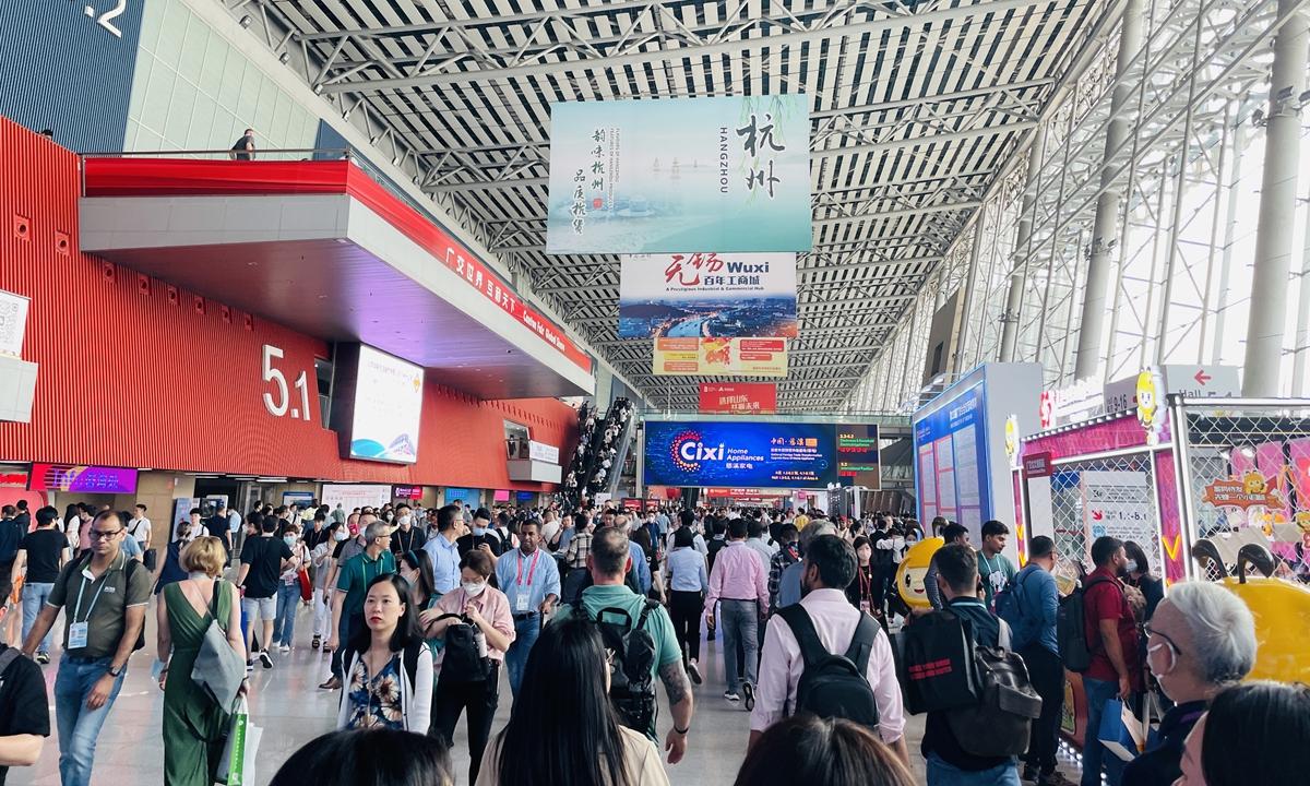 Exhibitors and buyers walk through the exhibition halls at the 133rd China Import and Export Fair, commonly known as the Canton Fair, in Guangzhou, South China's Guangdong Province on April 16, 2023. Photo: Chi Jingyi/GT