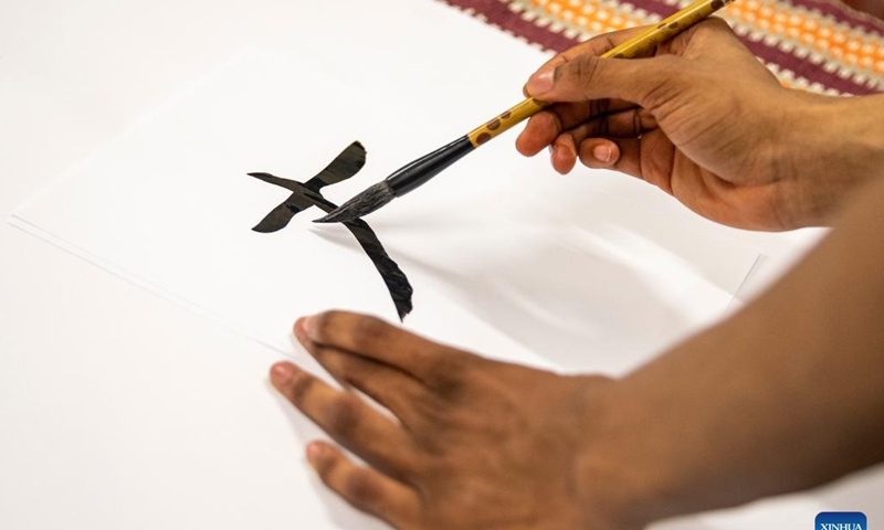 Students write Chinese calligraphy during an event celebrating the upcoming UN Chinese Language Day at the Confucius Institute at the University of Johannesburg in Johannesburg, South Africa, on April 19, 2023.(Photo: Xinhua)