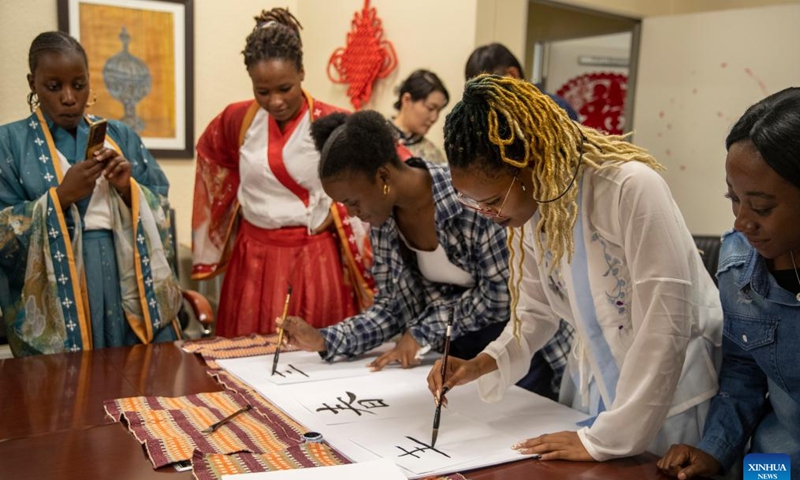 Students write Chinese calligraphy during an event celebrating the upcoming UN Chinese Language Day at the Confucius Institute at the University of Johannesburg in Johannesburg, South Africa, on April 19, 2023.(Photo: Xinhua)