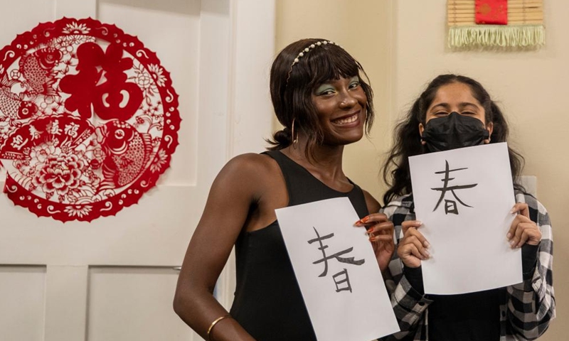 Students write Chinese calligraphy during an event celebrating the upcoming UN Chinese Language Day at the Confucius Institute at the University of Johannesburg in Johannesburg, South Africa, on April 19, 2023.(Photo: Xinhua)