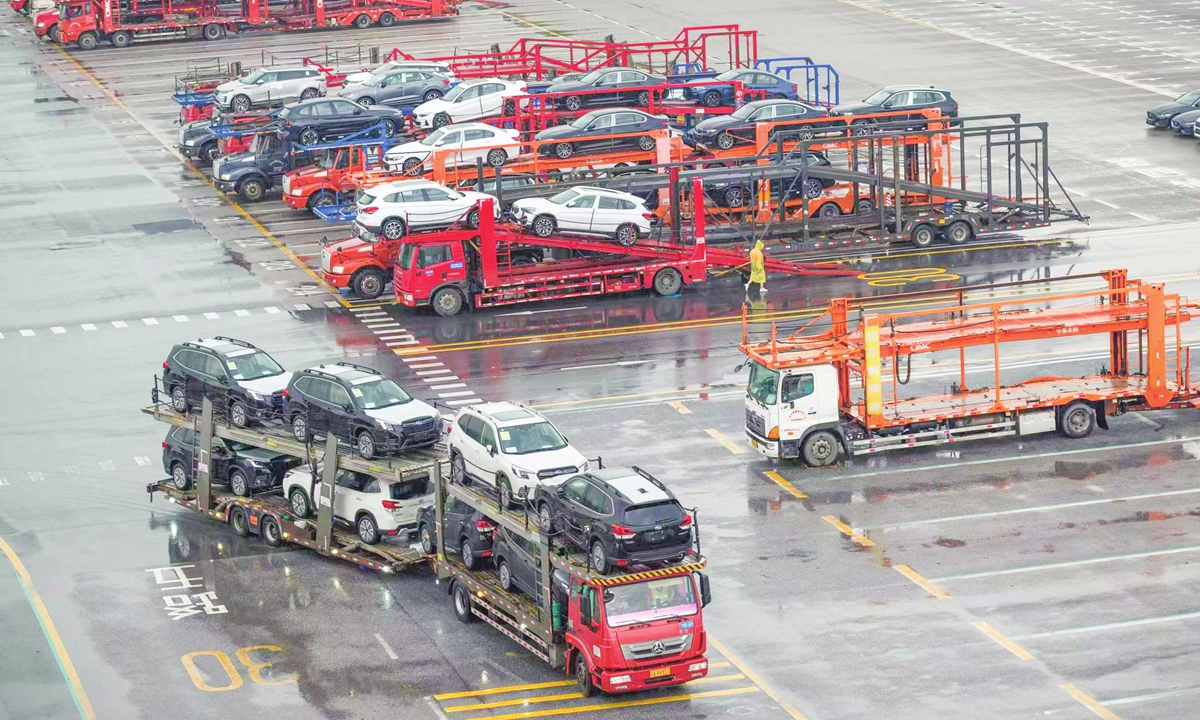 Transport trucks move cars inside a depot at Nansha Automobile Port in Guangzhou, South China's Guangdong Province on April 19, 2023. Photo: Chen Tao/GT