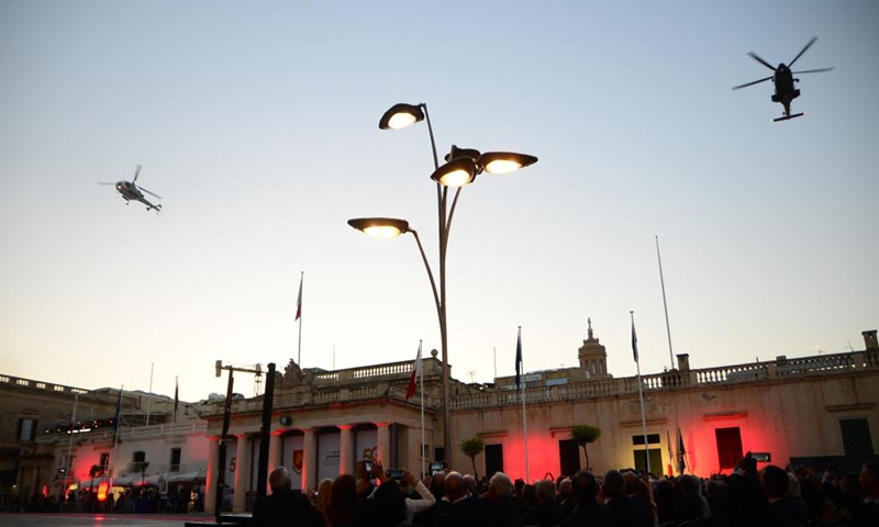 Helicopters fly over the sky during a parade in Valletta, Malta, on April 19, 2023. The Armed Forces of Malta (AFM) commemorated its 50th anniversary with a grand parade in Valletta on Wednesday.(Photo: Xinhua)
