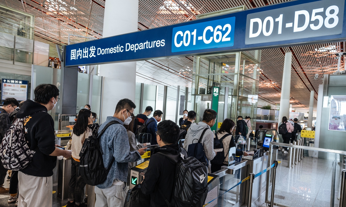 Travelers depart from the Beijing Capital International Airport on April 26, 2023 ahead of the May Day holidays. The airport will welcome or see off an average 166,000 passenger trips a day during the holidays. Photo: Li Hao/GT