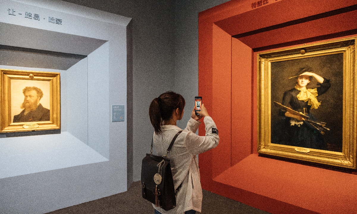 A visitor explores the exhibition at the National Museum of China in Beijing. Photo: Li Hao/Global Times