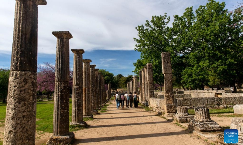 Tourists visit the archaeological site of Olympia in Ancient Olympia on the Peloponnese peninsula in Greece, April 21, 2023.(Photo: Xinhua)