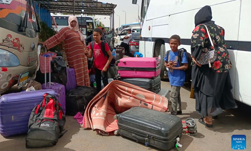 People fleeing from Sudan arrive at a bus station in Aswan, Egypt, on April 25, 2023. Many people crossed into Egypt through the border crossing between Egypt and Sudan, as conflict in the latter country continues.(Photo: Xinhua)