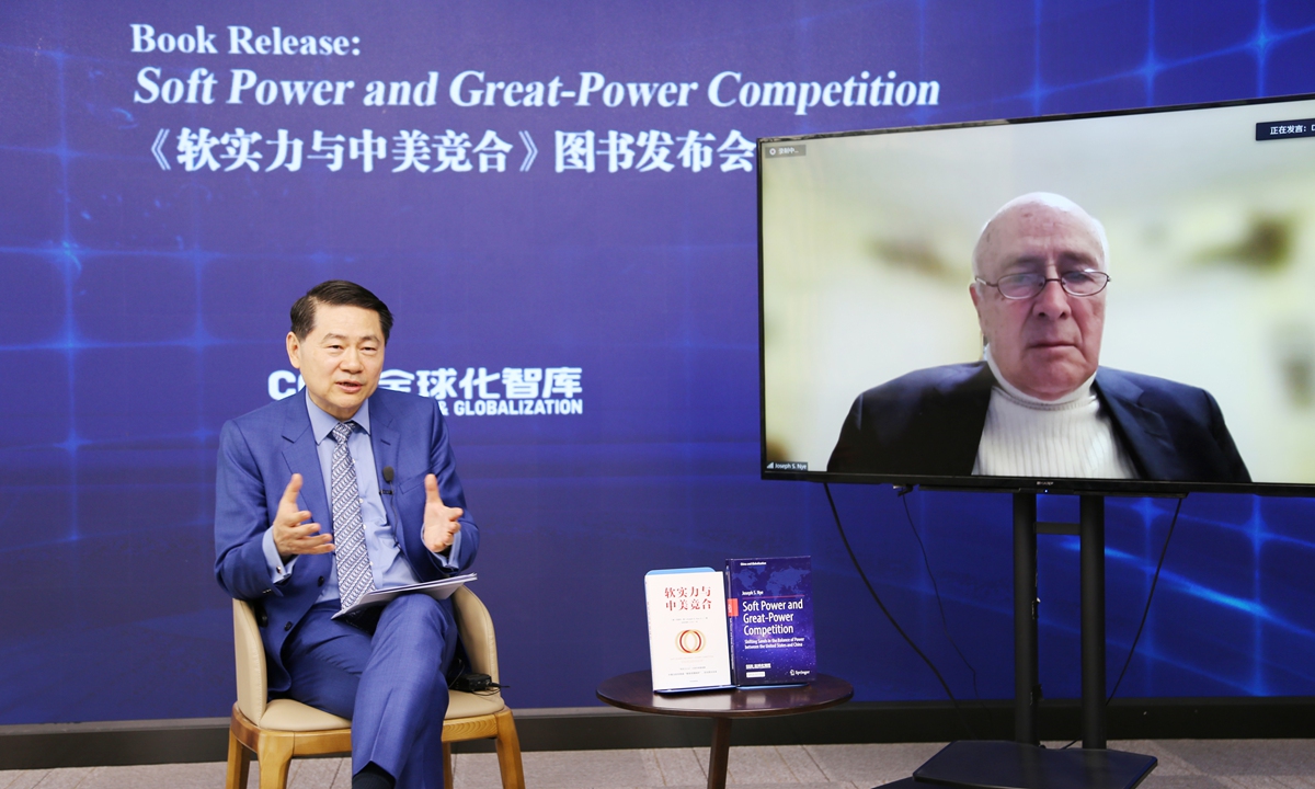 Wang Huiyao, CCG founder and president, talks with Joseph S. Nye Jr., former dean of the Harvard Kennedy School of Government, on April 28. Photo: CCG