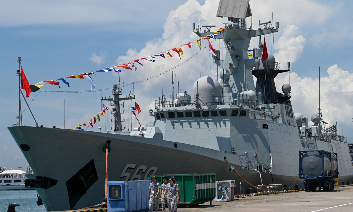 Chinese People's Liberation Army Navy guided-missile frigate <em>Yulin</em> docks at Changi Naval Base during International Maritime Defence Exhibition and Conference (IMDEX) Asia 2023 in Singapore on May 4, 2023. The IMDEX kicked off on May 3, displaying the latest maritime technology while aiming to enhance mutual trust and cooperation in the region. Photo: AFP