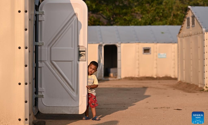 A migrant kid is seen at a shelter in city of Danli, southern Honduras, May 8, 2023. Danli in El Paraiso province bordering on Nicaragua has become a waystation on the travel route for thousands of migrants, most of them from South America or the Caribbean, who cross through Honduras en route to the north.(Photo: Xinhua)