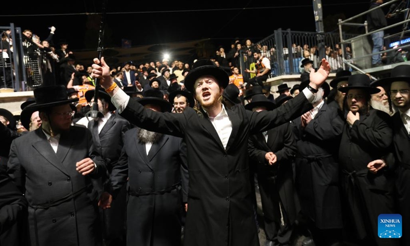 Ultra-Orthodox Jews participate in celebrations of the Jewish holiday of Lag BaOmer in Ashdod, Israel, on May 8, 2023.(Photo: Xinhua)
