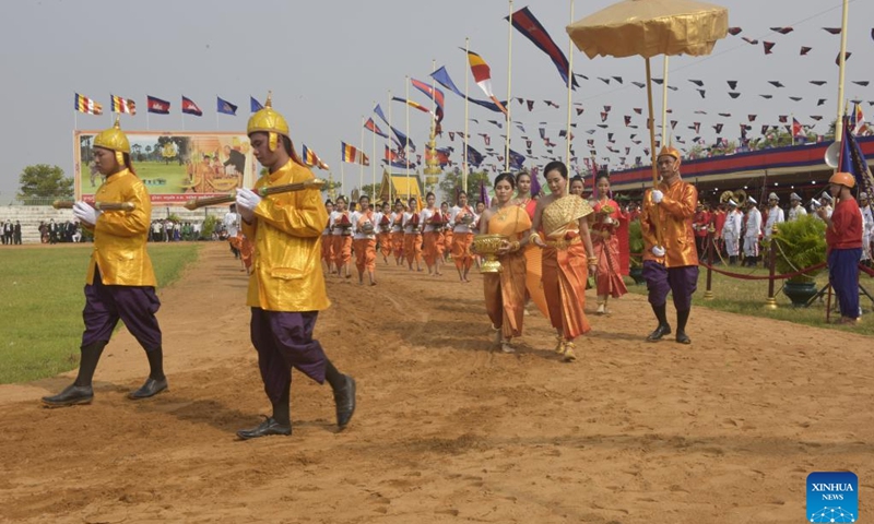 People dressed in traditional costumes attend the royal ploughing ceremony in Kampong Thom province, Cambodia, on May 8, 2023. Cambodia celebrated a traditional royal ploughing ceremony on Monday after a four-year hiatus due to the COVID-19 pandemic.(Photo: Xinhua)